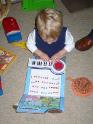 Playing his piano - he\'s becoming quite the young musician