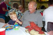 Giggling at a lobster that sang a silly song